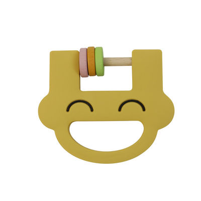 Il crepitio sveglio Teether del silicone dei giocattoli dei bambini del silicone del fronte di sorriso con personalizza il ODM dell'OEM di logo