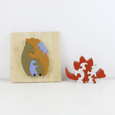Personalizzi il puzzle del silicone, i puzzle infantili 3D con la base di bambù di legno