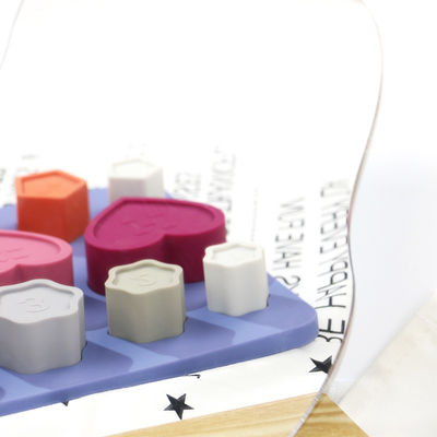 Puzzle del silicone del bambino del bambino non tossico con forma del fiore del cuore della stella