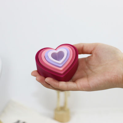 Silicone educativo del bambino che impila i blocchi con forma del fiore del cuore della stella