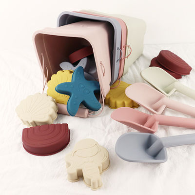 I giocattoli unisex del silicone del bambino, secchio della spiaggia del silicone hanno messo con personalizzano il logo