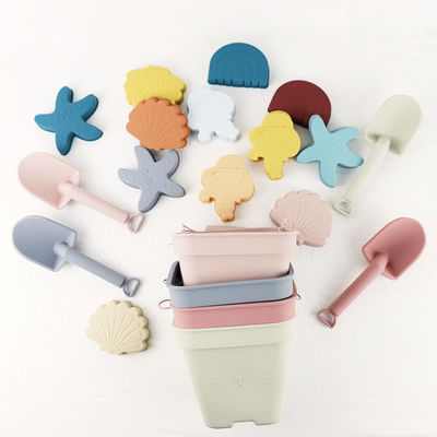 I giocattoli unisex del silicone del bambino, secchio della spiaggia del silicone hanno messo con personalizzano il logo