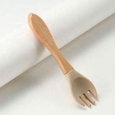 Commestibile le forchette ed i cucchiai del silicone termoresistenti con la maniglia di legno
