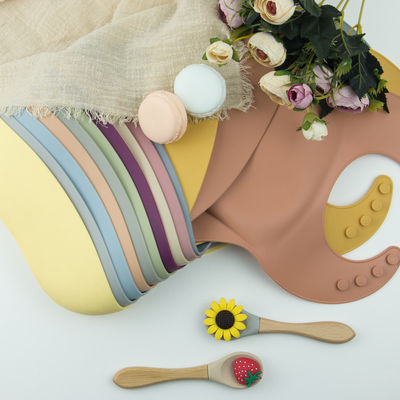 4 bene durevole molle impermeabile del silicone dei bottoni BPA della busbana francese libera del bambino regolabile