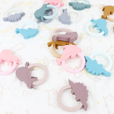 Forma di Teether Toy With Penguin Unicorn Raccoon del bambino del silicone del fumetto
