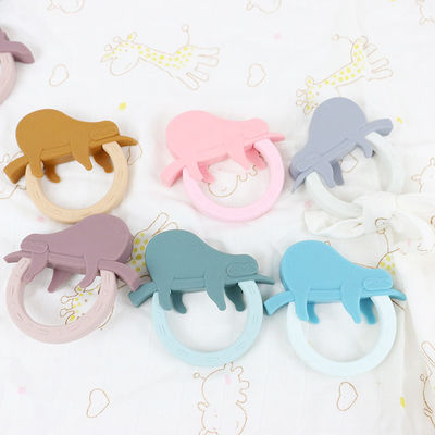 Forma di Teether Toy With Penguin Unicorn Raccoon del bambino del silicone del fumetto