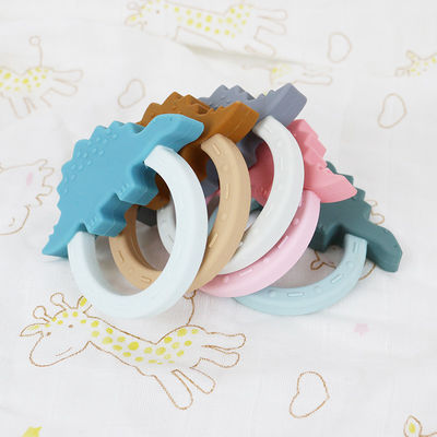 Forma di Teether Toy With Penguin Unicorn Raccoon del bambino del silicone del fumetto