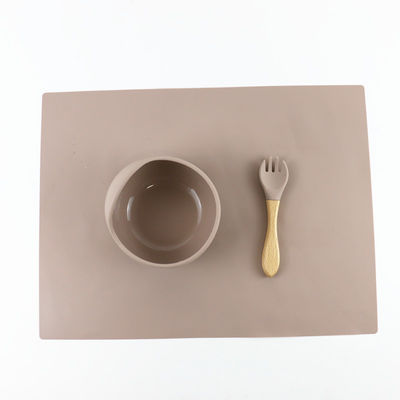 L'insieme delle stoviglie del silicone del commestibile, aspirazione del silicone ha diviso la piastrina impermeabile