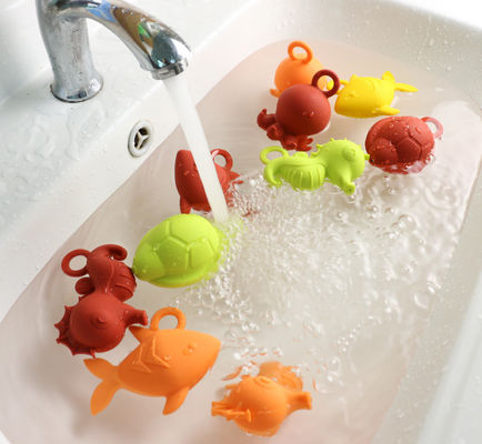 Il silicone di gomma del bambino di colori brillanti gioca BPA libero per il galleggiamento dell'acqua del bambino