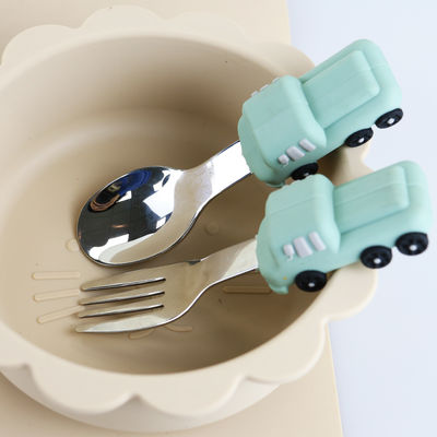 Cucchiaio del bambino di acciaio inossidabile del bambino con la maniglia del silicone di forma dell'automobile