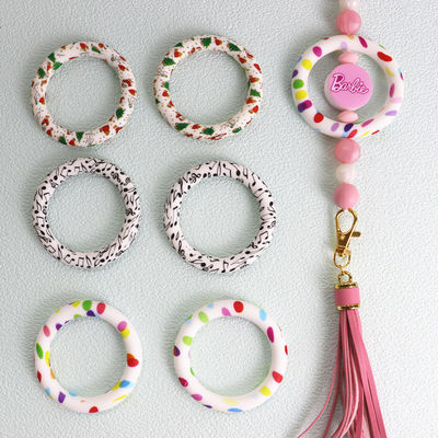 Le perle sicure MOQ BASSO del silicone di 100% hanno stampato i focals del giunto circolare del modello per DIY elabora la fabbricazione della catena chiave