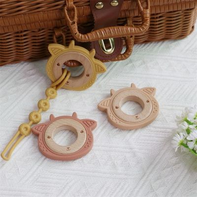 Teether per bambini in silicone multifunzionale con anello di legno adattabile per i denti con modello animale