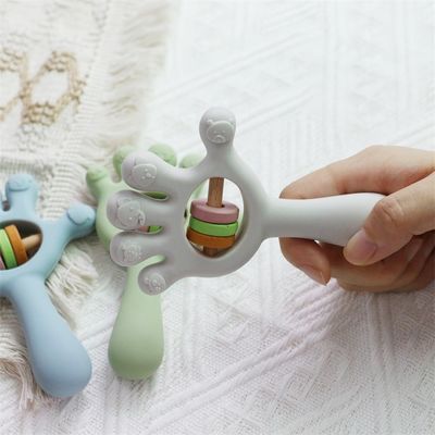 Soft Baby Silicone Teething Rattle Palm hand shape Toys: Senza BPA, non tossico, masticabile