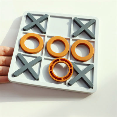 Ingrosso Puzzle XO in silicone personalizzato Logo Brand Bambino Puzzle di silicone didattico