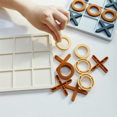 Ingrosso Puzzle XO in silicone personalizzato Logo Brand Bambino Puzzle di silicone didattico