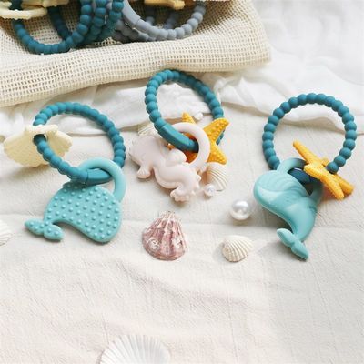 Teether per bambini in silicone di qualità alimentare con design non tossico e manica facile da impugnare
