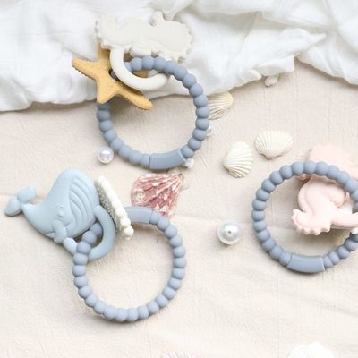 Teether per bambini in silicone di qualità alimentare con design non tossico e manica facile da impugnare