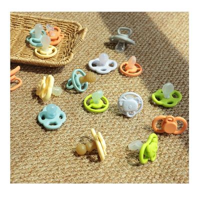 all'ingrosso diversi colori disponibili in magazzino consegna veloce bambino libero da BPA denti calmante bambino morbido silicone ciuccio