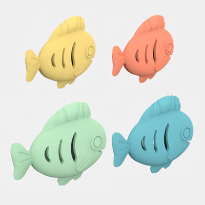 Ingrosso colorato Bpa Grado alimentare gratuito Silicone per cani da compagnia allenamento pesce forma giocattoli snack perdita lenta alimentatore di silicone pesce giocattoli